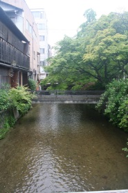 The Shirakawa river and the bridge to the entrance of Shiraume