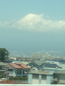 ...and catch a glimpse of Mt. Fuji from the train window on the way. This picture doesn't do it justice. Mt. Fuji is huge and imposing. A real presence no matter how far away you are.